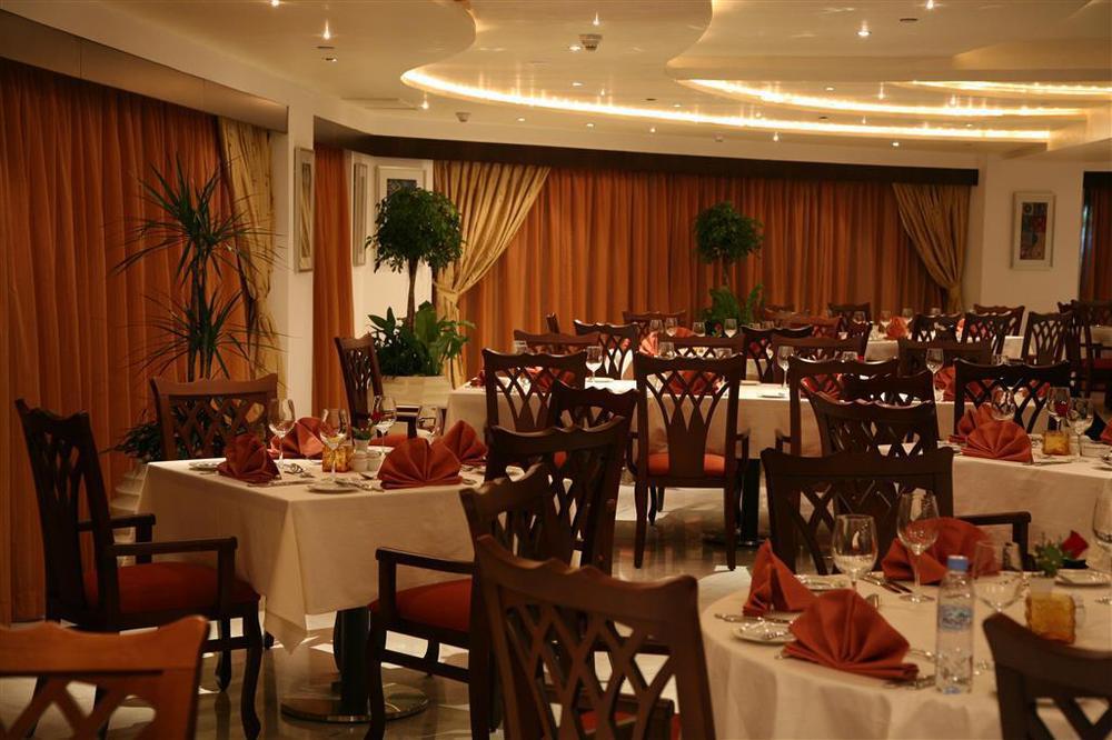 Symphony Hotel Apartments Dubái Restaurante foto